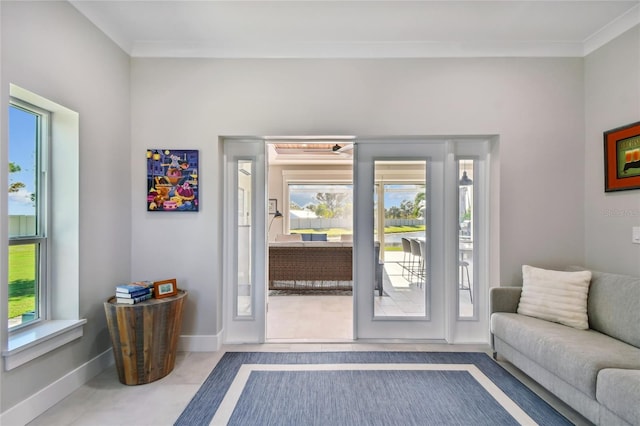 entryway featuring ornamental molding