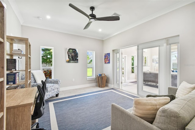 interior space with ceiling fan and crown molding