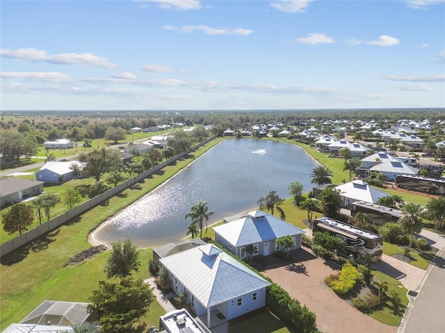 drone / aerial view with a water view