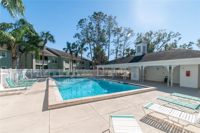 view of swimming pool featuring a patio