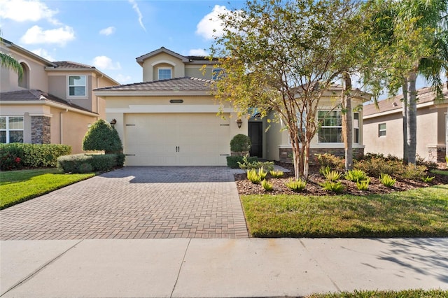 view of front of home with a garage