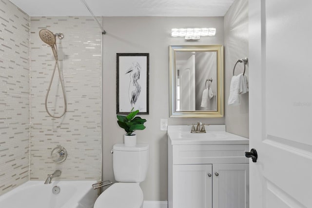 full bathroom with tiled shower / bath combo, toilet, and vanity