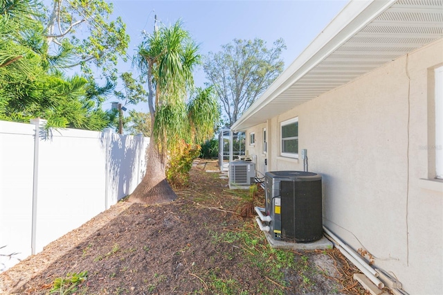 view of yard with central AC