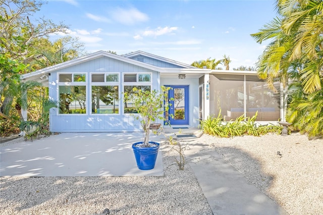 view of front facade featuring a sunroom