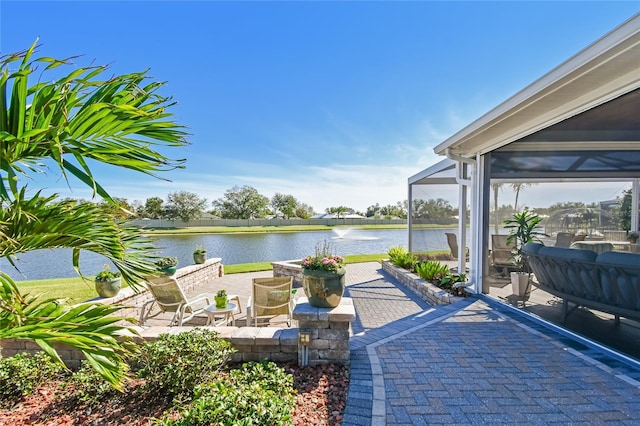 view of patio featuring a water view