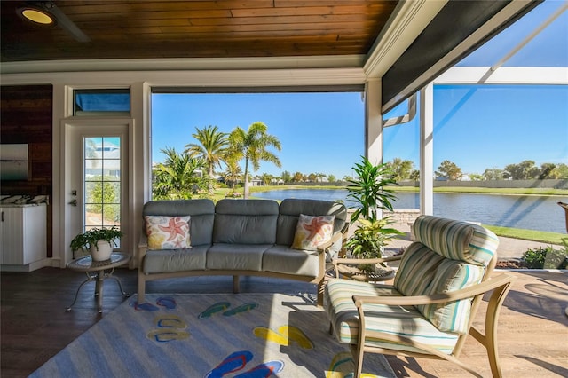 sunroom with a water view and wood ceiling