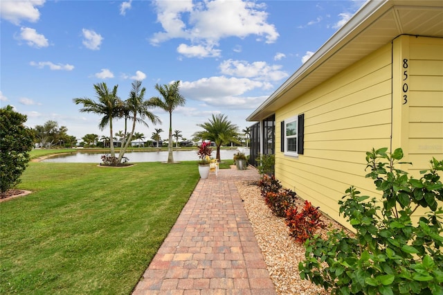 view of yard with a water view