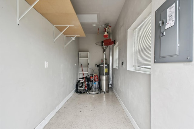 utility room with electric water heater and electric panel