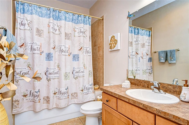 full bathroom with toilet, vanity, tile patterned floors, and shower / bath combo with shower curtain