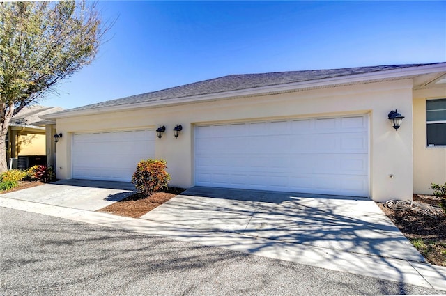 garage featuring central AC unit