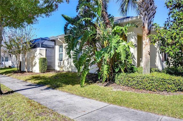 view of front of home with a front lawn