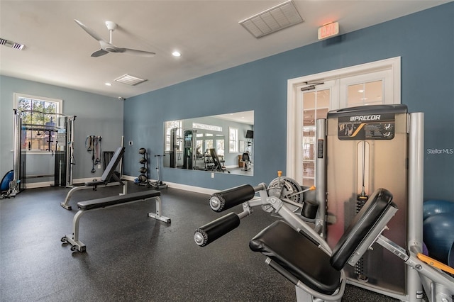 exercise room with ceiling fan