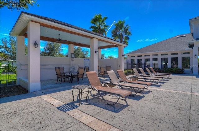 view of patio featuring ceiling fan