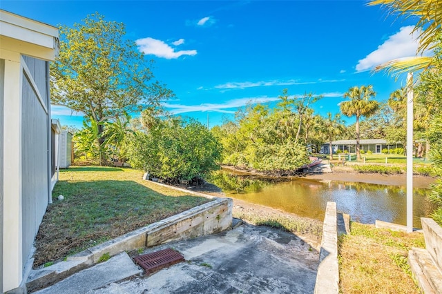 view of yard with a water view