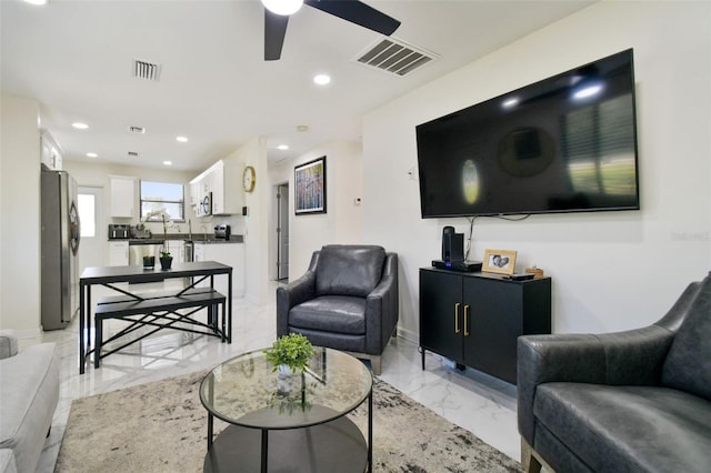 living room with ceiling fan