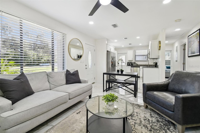 living room with ceiling fan