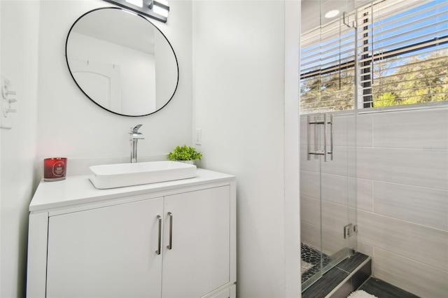 bathroom featuring vanity and walk in shower