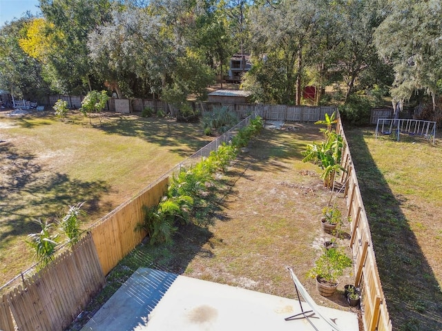 view of yard with a trampoline