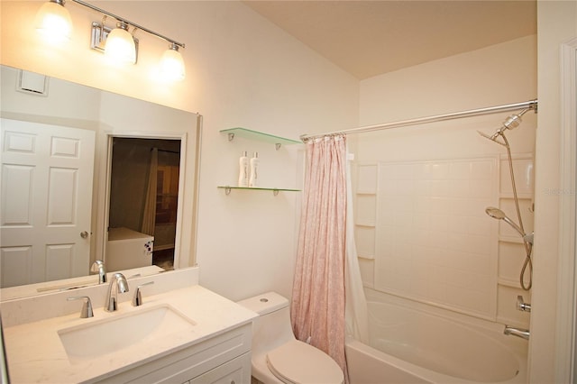 bathroom with toilet, shower / tub combo with curtain, and vanity