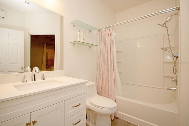 bathroom with toilet, shower / tub combo, visible vents, and vanity