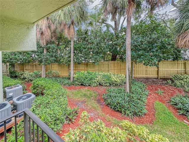 1515 Pinellas Bayway S Unit 40, Saint Petersburg, FL 33715 - fenced backyard featuring central air condition unit