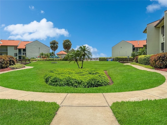 view of community with a lawn