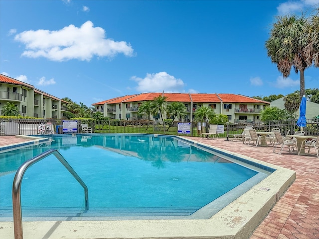 view of swimming pool featuring a patio