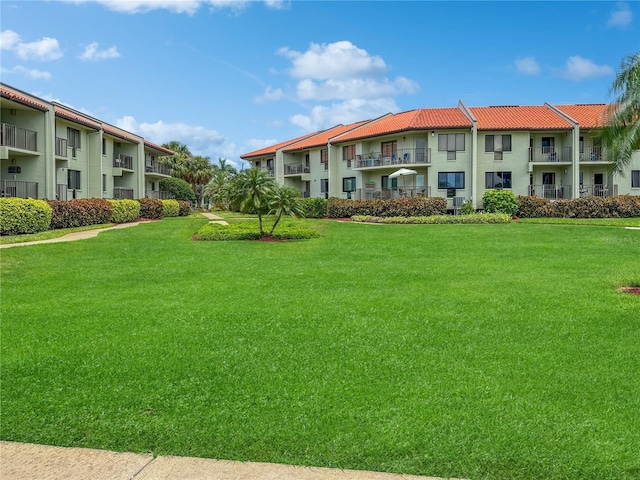 1515 Pinellas Bayway S Unit 40, Saint Petersburg, FL 33715 - view of property's community featuring a yard and a residential view