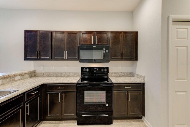 kitchen featuring baseboards, light countertops, dark brown cabinets, and black appliances