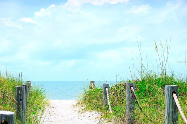 view of water feature with a beach view