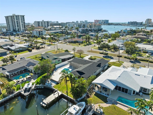 birds eye view of property featuring a water view