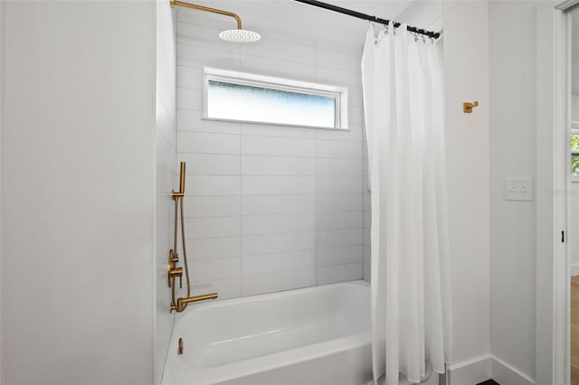 bathroom featuring shower / bath combination with curtain