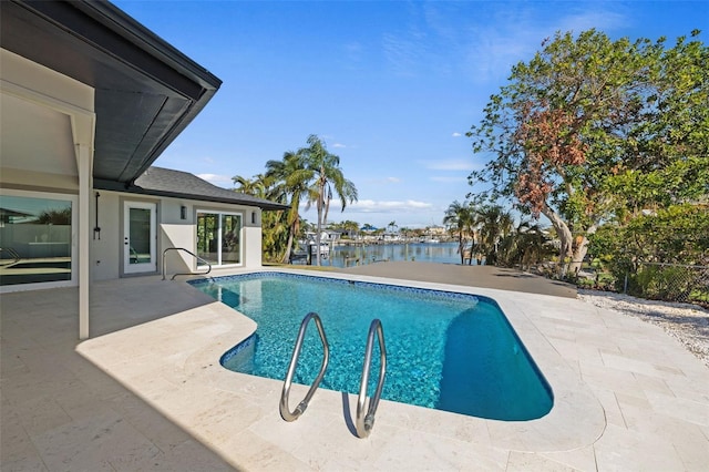 475 Island Way, Clearwater Beach, FL 33767 - swimming pool with a patio area and a water view