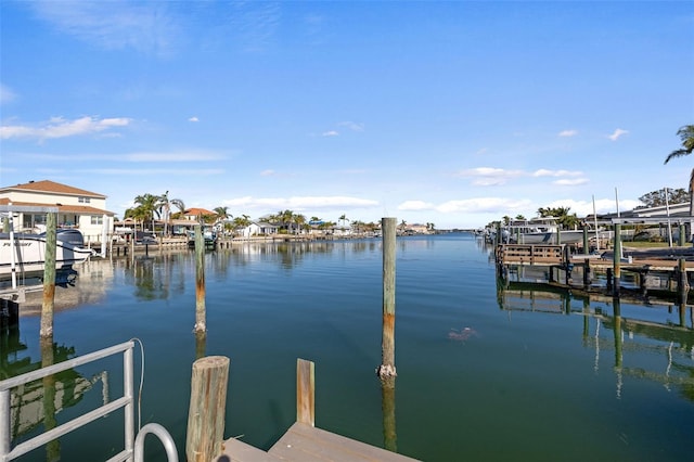 475 Island Way, Clearwater Beach, FL 33767 - dock featuring boat lift and a water view