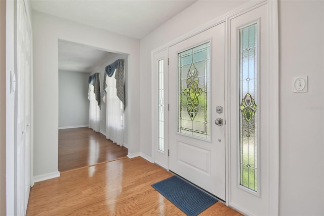 entryway with light hardwood / wood-style flooring