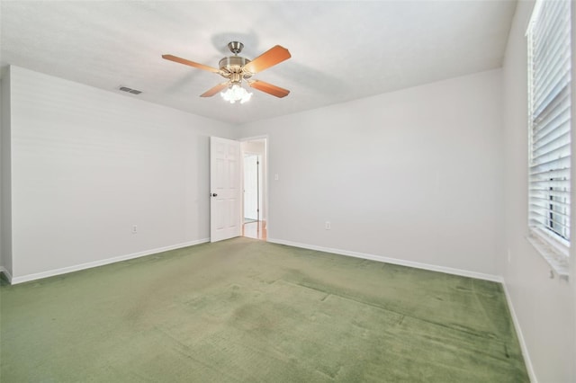 unfurnished room featuring carpet