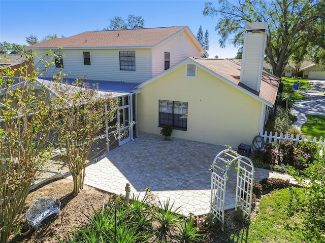 back of property featuring a patio area