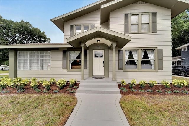 view of front of home with a front lawn