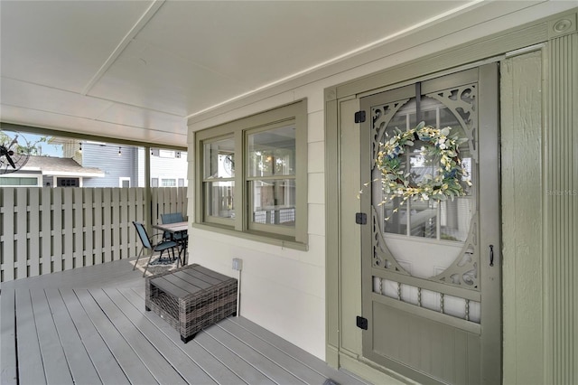 doorway to property with covered porch