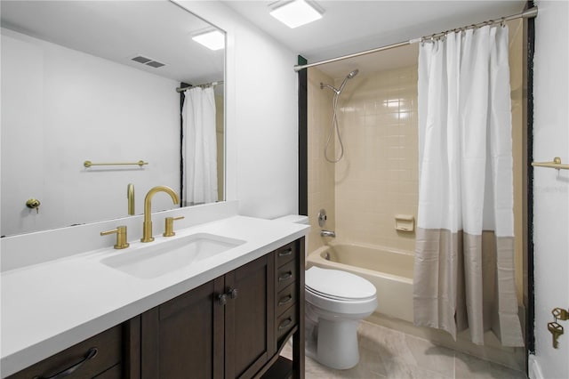 full bathroom with tile patterned floors, vanity, toilet, and shower / tub combo with curtain