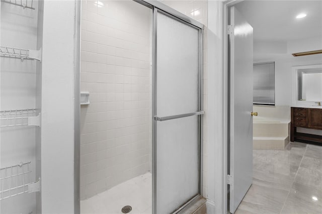 bathroom with a shower with shower door