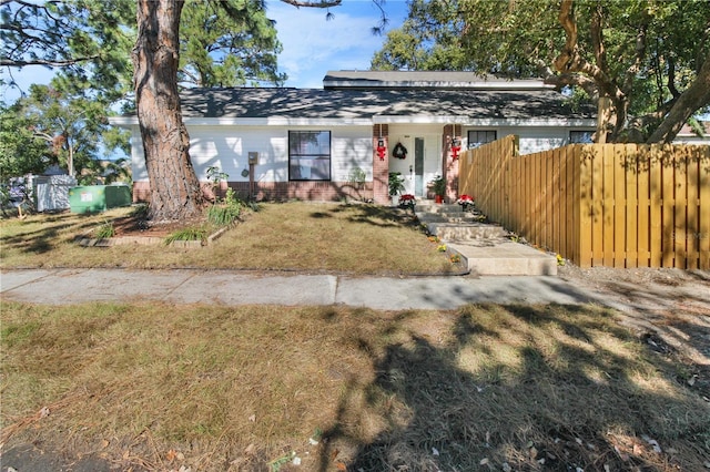 view of front of property with a front lawn