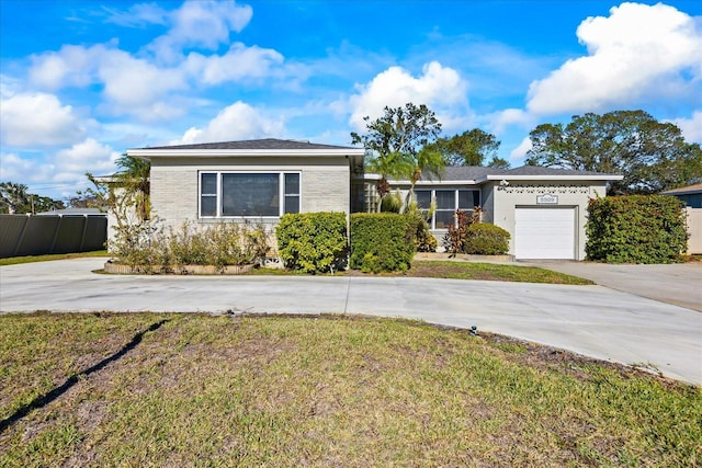 single story home featuring a garage