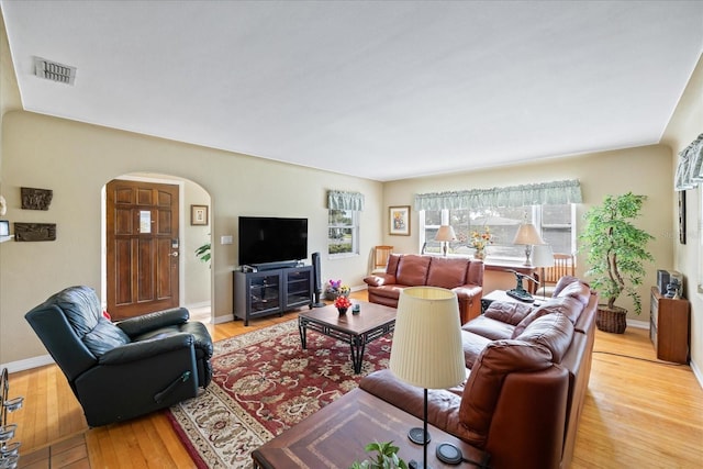 living room with light hardwood / wood-style floors