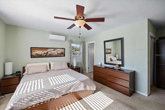 carpeted bedroom featuring ceiling fan and a wall unit AC