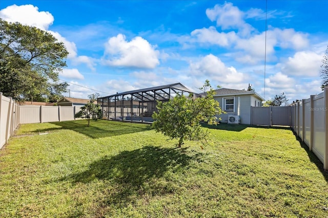 view of yard with a lanai