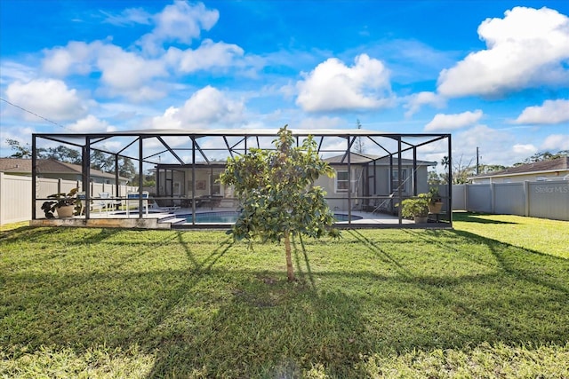 view of yard with a patio area and a lanai