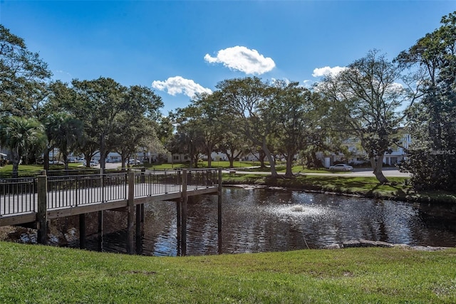 2451 Canadian Way Unit 47, Clearwater, FL 33763 - view of community with a water view and a yard