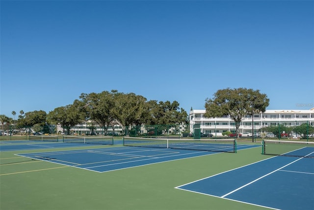 2451 Canadian Way Unit 47, Clearwater, FL 33763 - view of tennis court featuring community basketball court