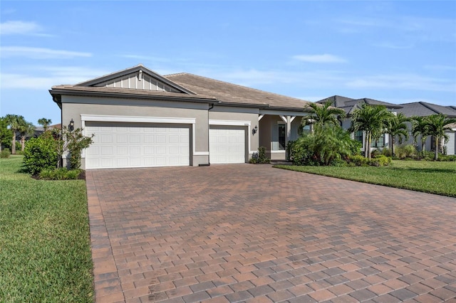 ranch-style house with a front yard and a garage